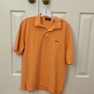 Nice men’s polo shirt with embroidered fish. Color is really peach.